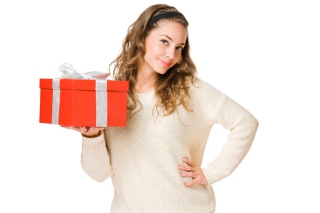 Portrait of a cute young brunette with bright red gift box の写真素材