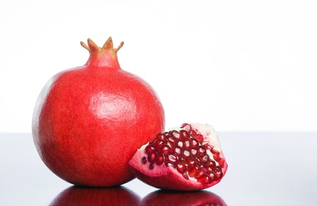 Studio shot of appetizing juicy fresh pomegranate.の写真素材