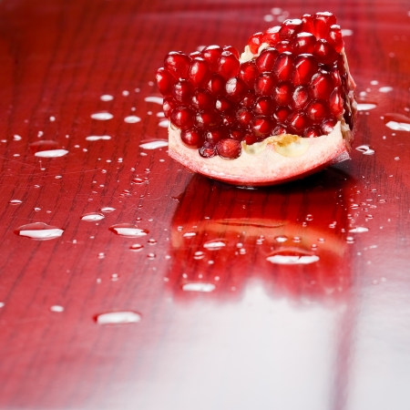 Closeup shot of juicy fresh pomegranate seeds.の写真素材