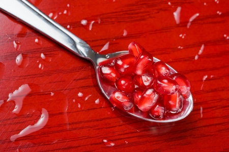 Macro shot of arils or seeds from pomegranate fruit.の写真素材