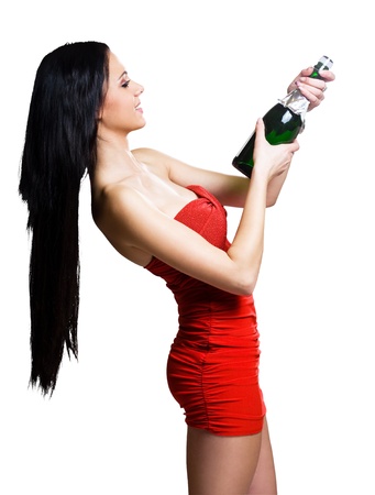Gorgeous young brunette woman ready to celebrate with champagne.の写真素材