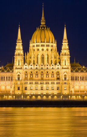 Golden lights at night on the Hungarian Parliament in Budapest.のeditorial素材