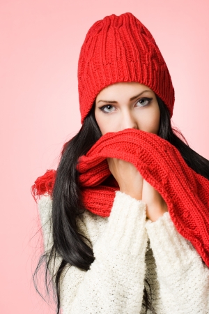 Portrait of winter fashion beauty in warm white sweater の写真素材
