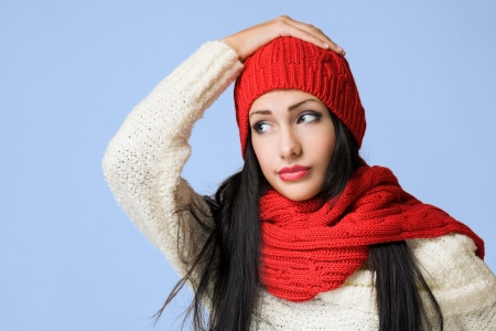 Gorgeous young brunette woman in colorful winter fashion の写真素材