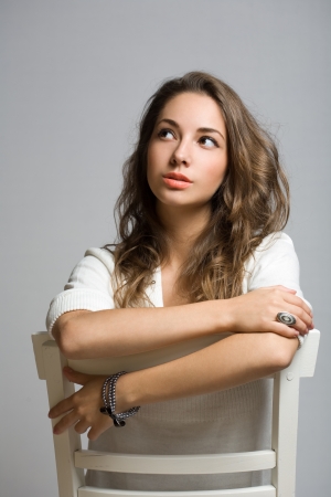 Portrait of gorgeous thoughtful young brunette woman の写真素材