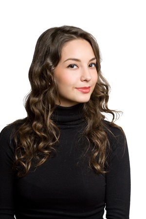 Portrait of a smiling friendly young brunette.の写真素材