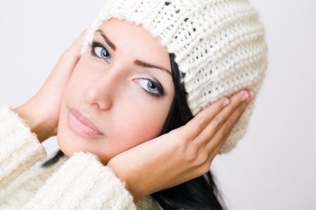 Portrait of a beautiful cute winter fashion girl.の写真素材