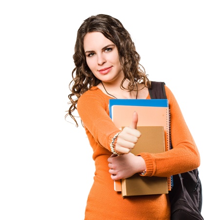 Attractive brunette student woman in orange sweater.の写真素材