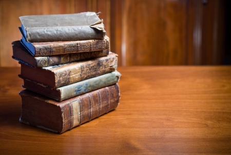 Still life of mysterious looking ancient books in elegant setting.の写真素材