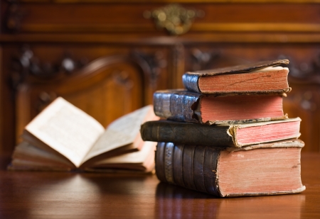 Still life of mysterious looking ancient books in elegant setting.の写真素材