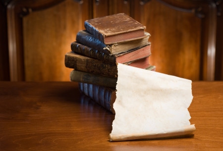 Ancient knowledge, pile of stylish, worn collectors item antique books.の写真素材