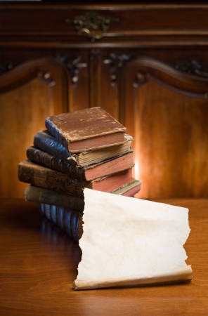 Shot of mysterious looking beautiful worn antique books.の写真素材