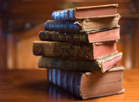 Shot of mysterious looking beautiful worn antique books.の写真素材