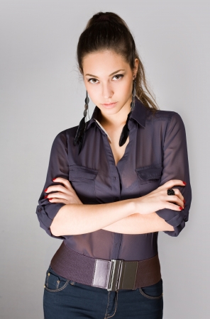 Portrait of an attractive fashionable young brunette woman.の写真素材