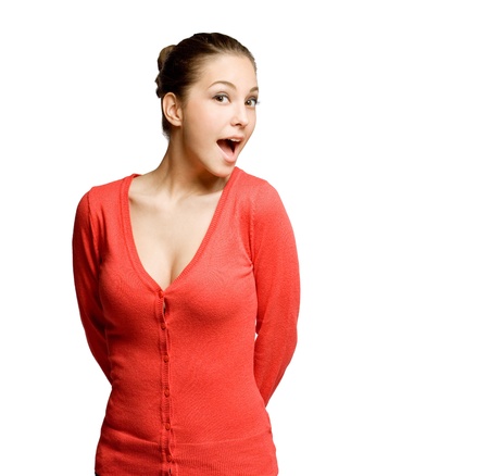 Portrait of a funny shocked looking beautiful young brunette woman の写真素材