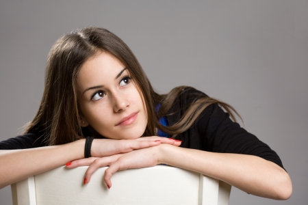 Expressive portrait of cute young brunette teen girl.の写真素材