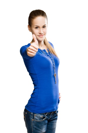 Portrait of a slender young brunette showing big thumbs up.の写真素材