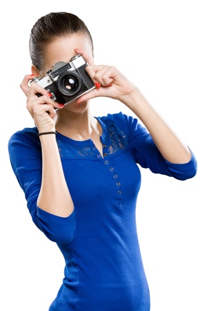 Portrait of a beautiful young brunette with photo camera.の写真素材