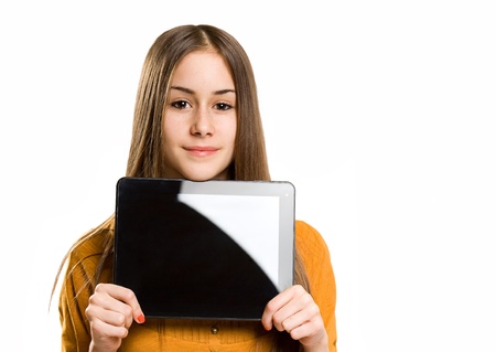 Portrait of a cute cool teen girl using tablet device.の写真素材