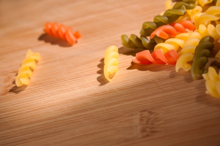 Shot of colorful pasta ingredient drenched in sunlight の写真素材