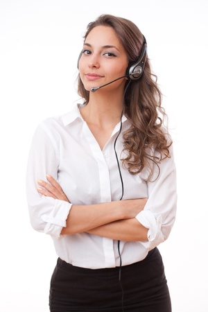 Portrait of smiling friendly office girl wearing headset.の写真素材