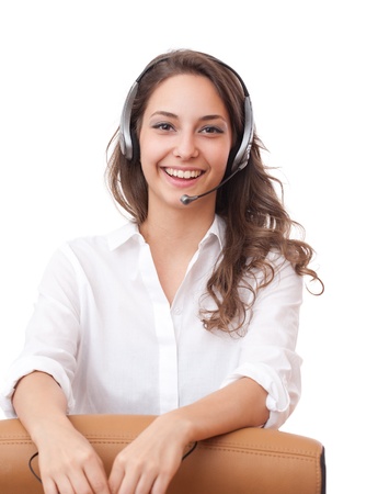 Portrait of smiling friendly office girl wearing headset.の写真素材