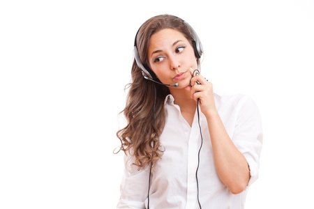 Portrait of a fashionable cute office girl wearing headset.の写真素材