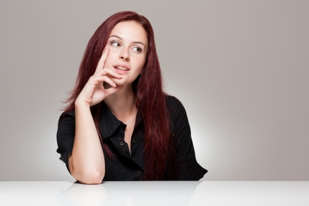 Expressive portrait of a beautiful young redhead woman.の写真素材