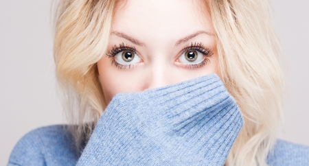 Portrait of a colorful cute winter fashion girl.の写真素材