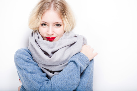 Portrait of a colorful cute winter fashion girl.の写真素材