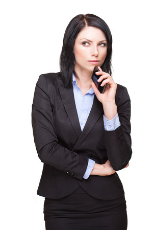 Portrait of a cool young businesswoman isolated on white.の写真素材