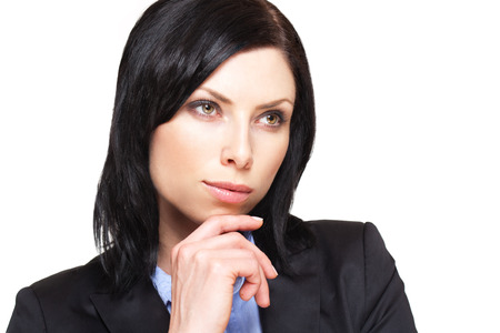 Portrait of a cool young businesswoman isolated on white.の写真素材