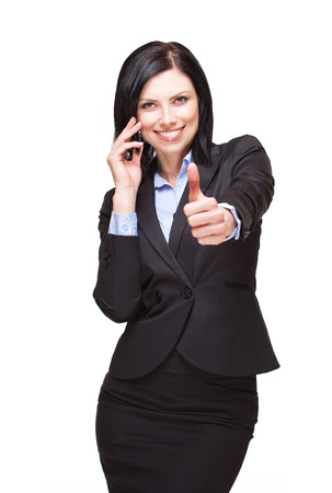 Portrait of an elegant beautiful businesswoman isolated on whiteの写真素材
