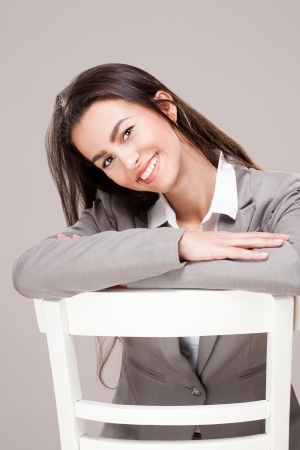 Portrait of happy and confident young brunette beauty.の写真素材