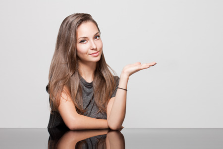 Portrait of a gorgeous young cute brunette woman.の写真素材