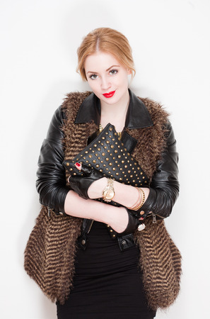 Portrait of a very stylish fashionable young blond woman.の写真素材