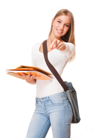 Portrait of an attractive young student with exercise books.の写真素材