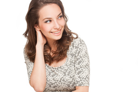 Expressive portrait of a gorgeous happy young brunette woman.の写真素材