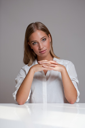 Portrait of a beautiful expressive young blond woman.の写真素材