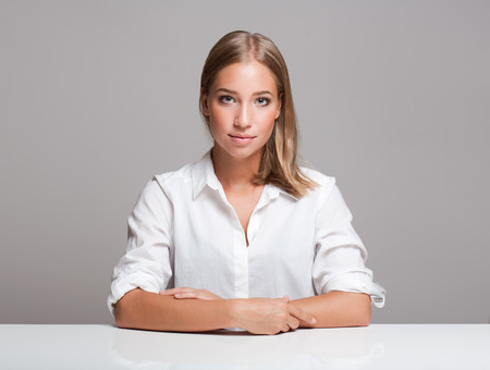 Portrait of a beautiful expressive young blond woman.の写真素材
