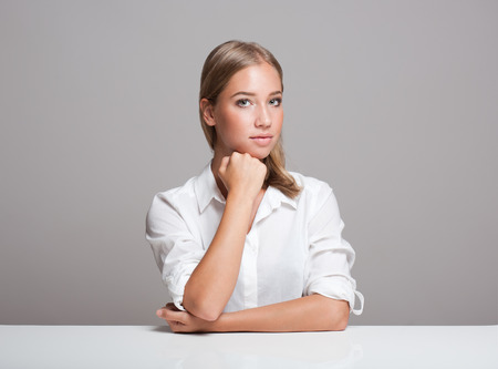 Portrait of a beautiful expressive young blond woman.の写真素材