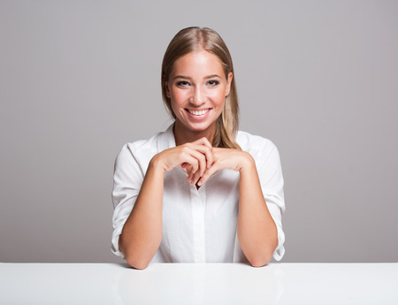Portrait of a beautiful expressive young blond woman.の写真素材