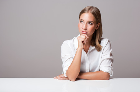Portrait of a gorgeous expressive young blond beauty.の写真素材