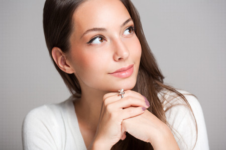 Closeup portrait of a cheerful friendly brunette.の写真素材