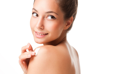Portrait of a gorgeous young brunette beauty with cosmetics.の写真素材