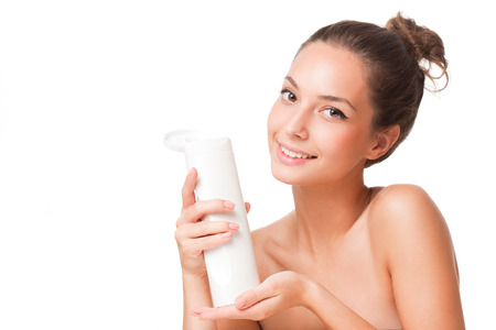 Portrait of a gorgeous young brunette beauty with cosmetics.の写真素材