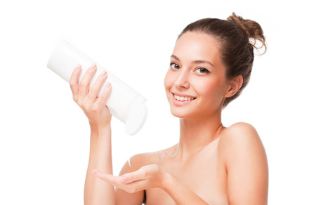 Portrait of a gorgeous young brunette beauty with cosmetics.の写真素材