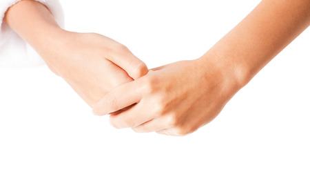 Female hands using body lotion, isolated on white background.の写真素材