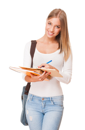 Portrait of a beautiful young blond student girl.の写真素材