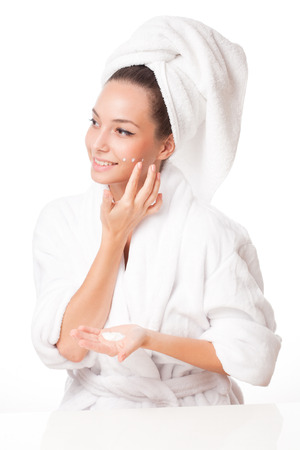 Portrait of gorgeous brunette using body milk.の写真素材